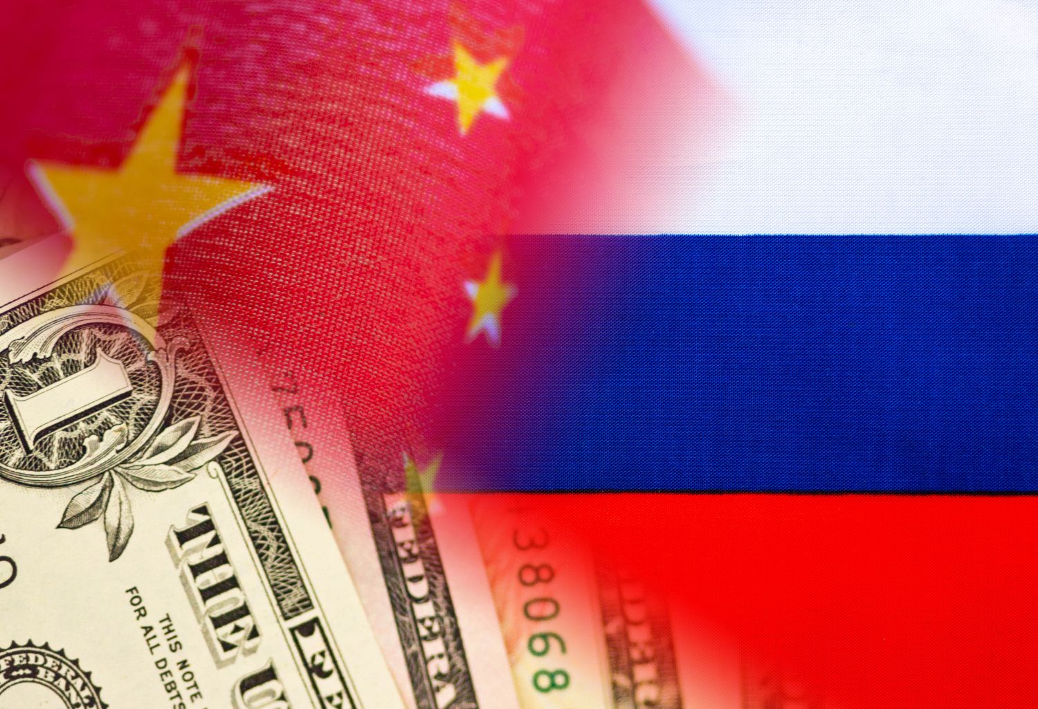 Russia Flag and American flag over US Dollars. Debt Collection in USA-Russia International Trade